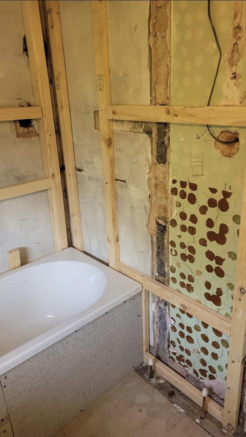 New timber studwork built around a new bath